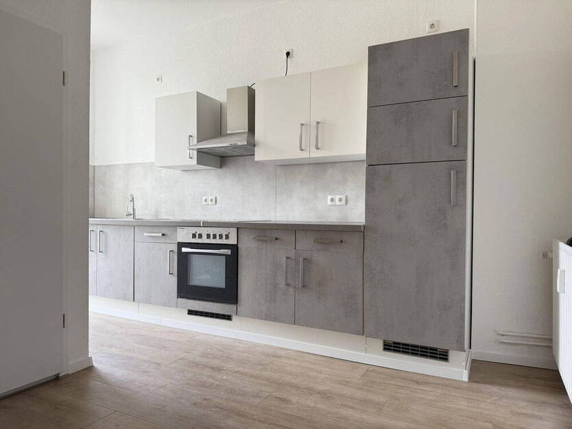Modern sanierte 1,5-Zimmer-Wohnung mit Einbauküche und Balkon