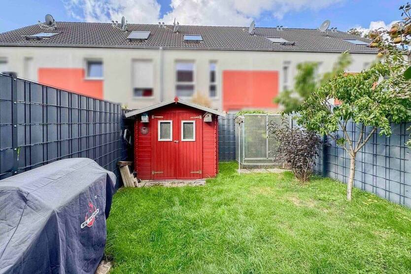 Modernes Reihenmittelhaus mit kleinem Garten und Einzelgarage in Ratingen - KfW 70 Effizienz!