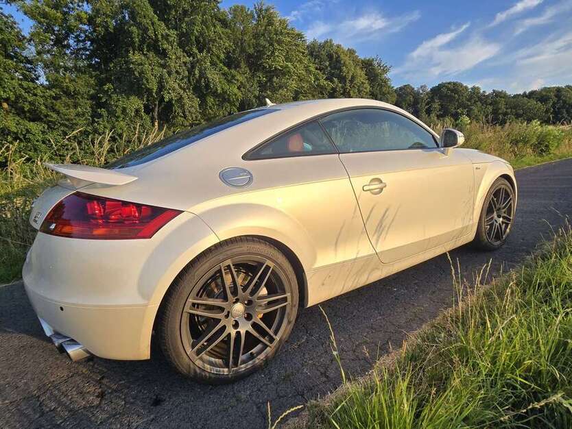 TT
