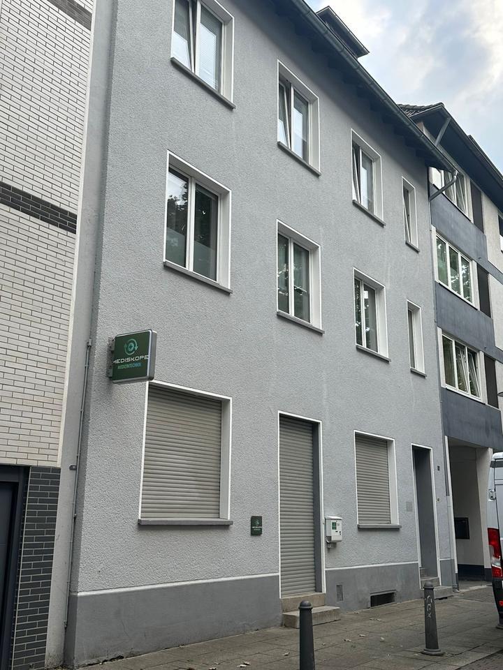 Attraktives Mehrfamilienhaus mit Büroflächen
