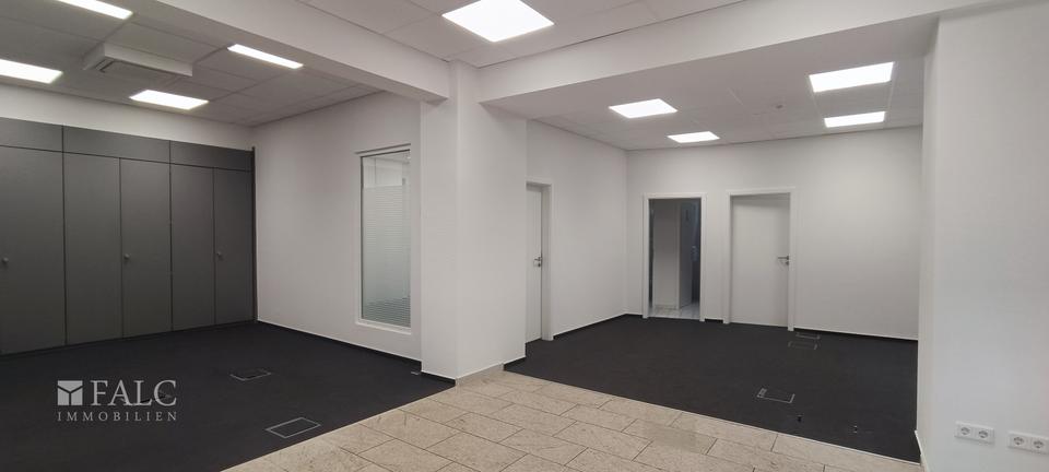 Raum für Visionen – stilvolle Gewerbeimmobilie mit Glasfront und Charakter zimmer