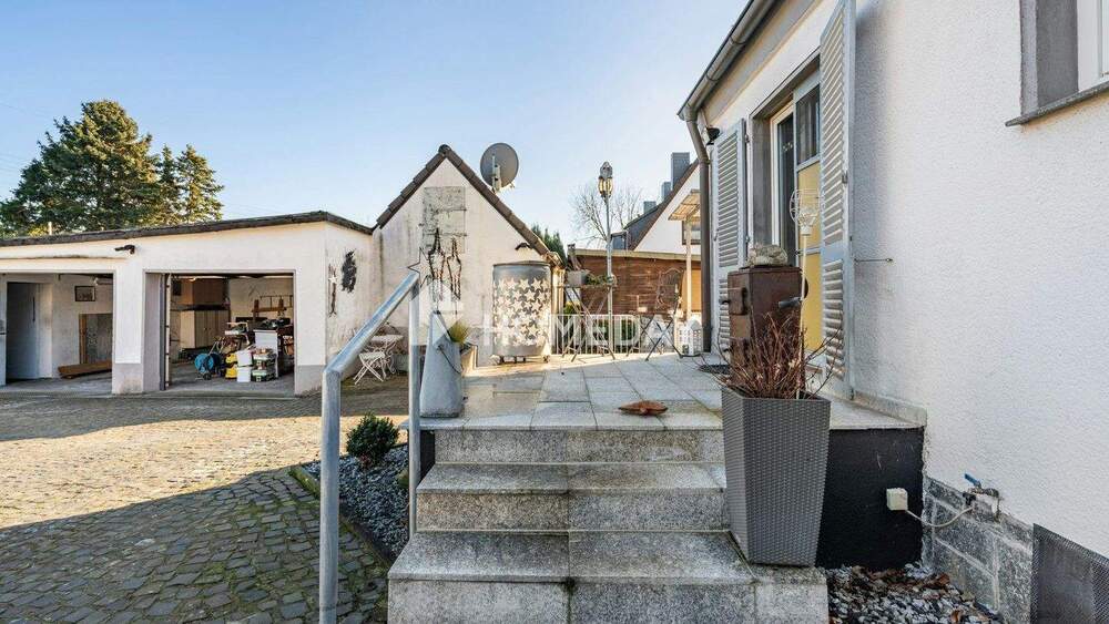 Großzügiges Wohnen mit Kamin, Garten und zusätzlichem Nebengebäude 5 zimmer