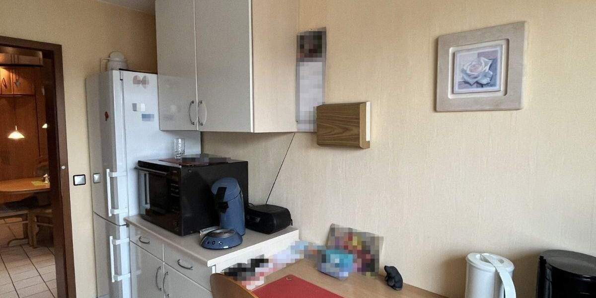 3-Zimmer Dachgeschosswohnung mit großem Balkon und PKW-Stellplatz in Duisburg-Bergheim 3 zimmer