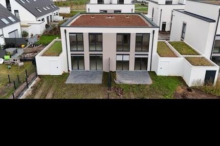 Neubau- Doppelhaushälfte 4 zimmer