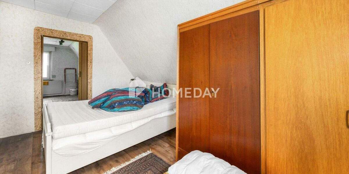 Charmante Doppelhaushälfte mit ELW, Garten & Vermietungspotenzial - idyllisch wohnen in ruhiger Lage 6 zimmer