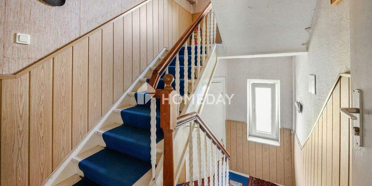 Charmante Doppelhaushälfte mit ELW, Garten & Vermietungspotenzial - idyllisch wohnen in ruhiger Lage 6 zimmer