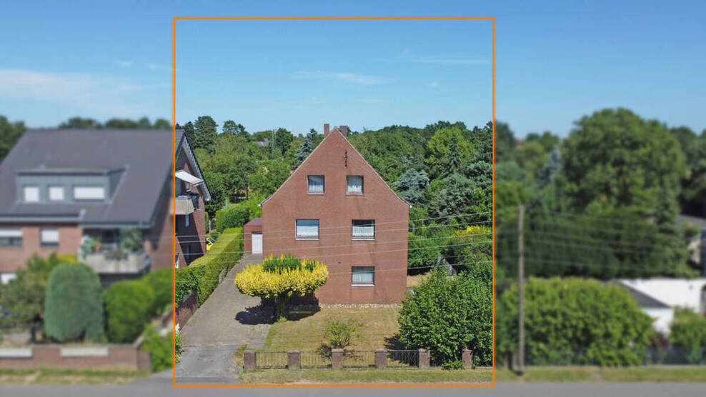 Dreifamilienhaus mit großzügigem Grundstück in zentraler Lage von Voerde-Friedrichsfeld!