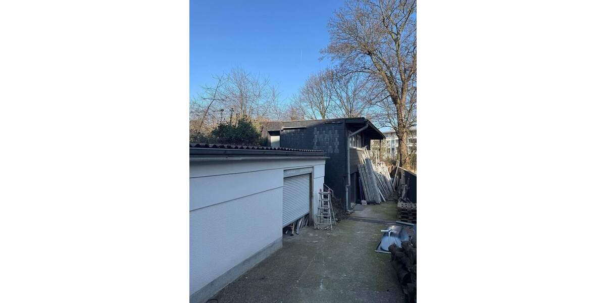 Mehrfamilienhaus mit Gewerbeeinheit im Hof am Innenhafen 1 zimmer