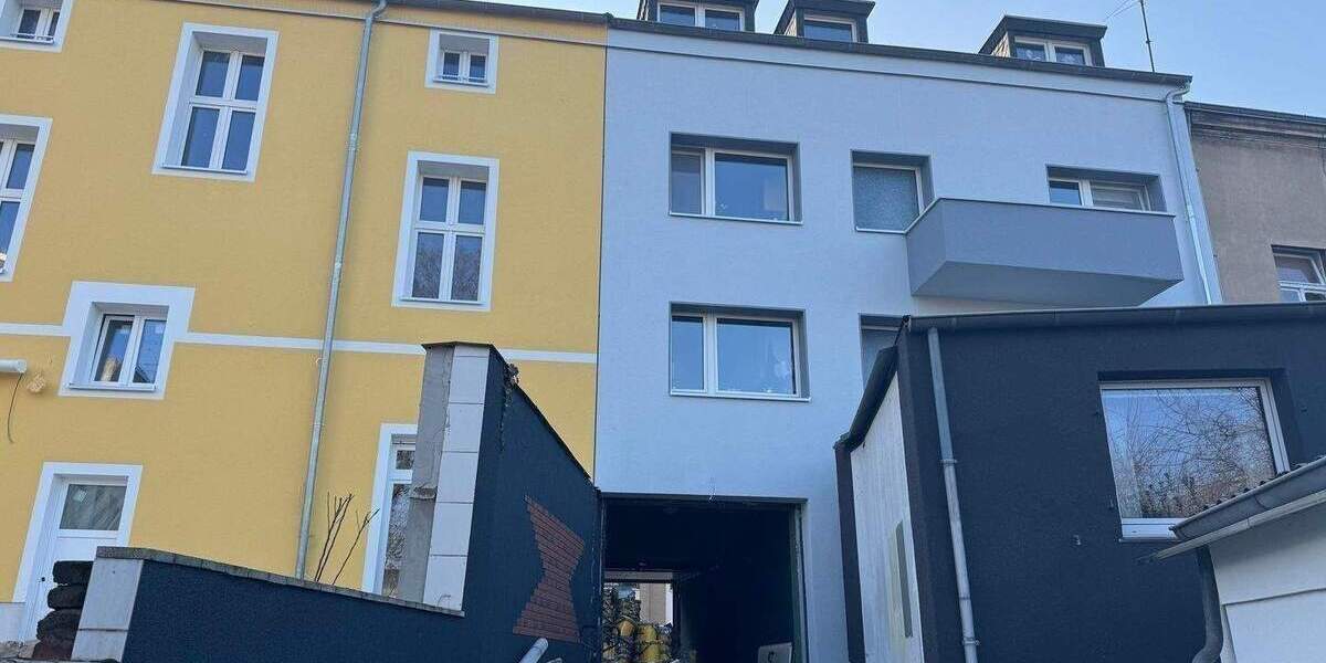 Mehrfamilienhaus mit Gewerbeeinheit im Hof am Innenhafen 1 zimmer