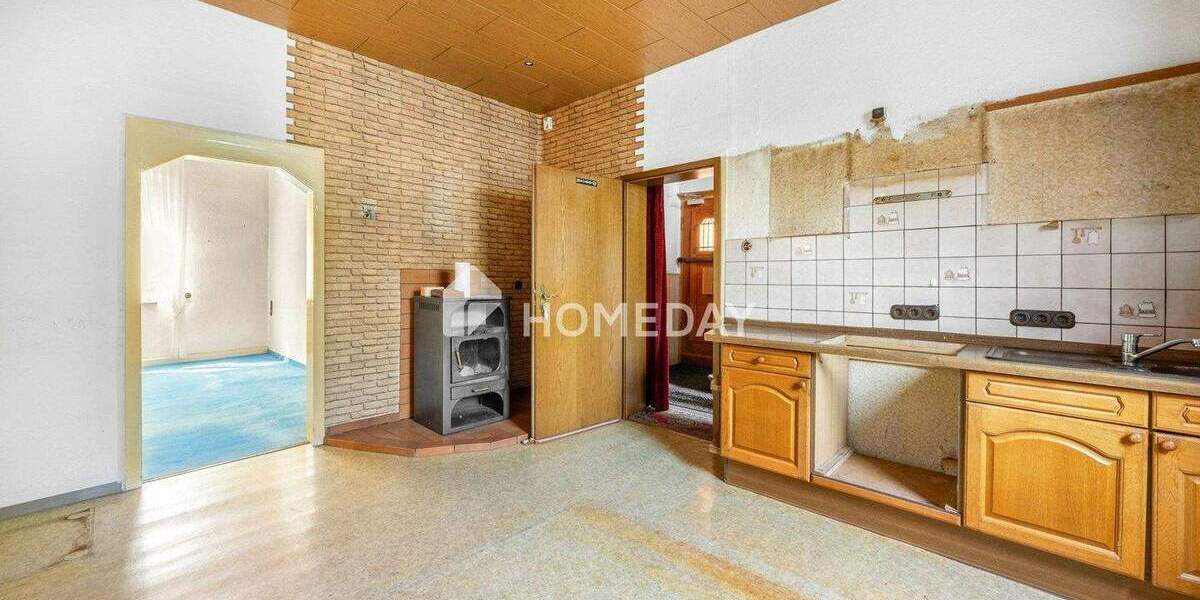 Charmante Doppelhaushälfte mit ELW, Garten & Vermietungspotenzial - idyllisch wohnen in ruhiger Lage 6 zimmer