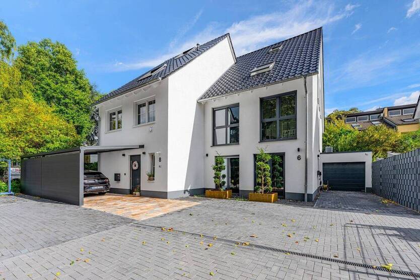 Nachhaltig & stilvoll: Neubau-Doppelhaushälfte mit offenem Wohnkonzept und Garten