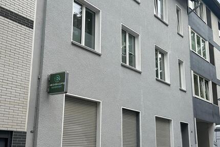 Attraktives Mehrfamilienhaus mit Büroflächen