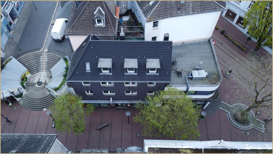 Mehrfamilienhaus mit Gewerbeeinheit – attraktive Kapitalanlage in zentraler Lage zimmer