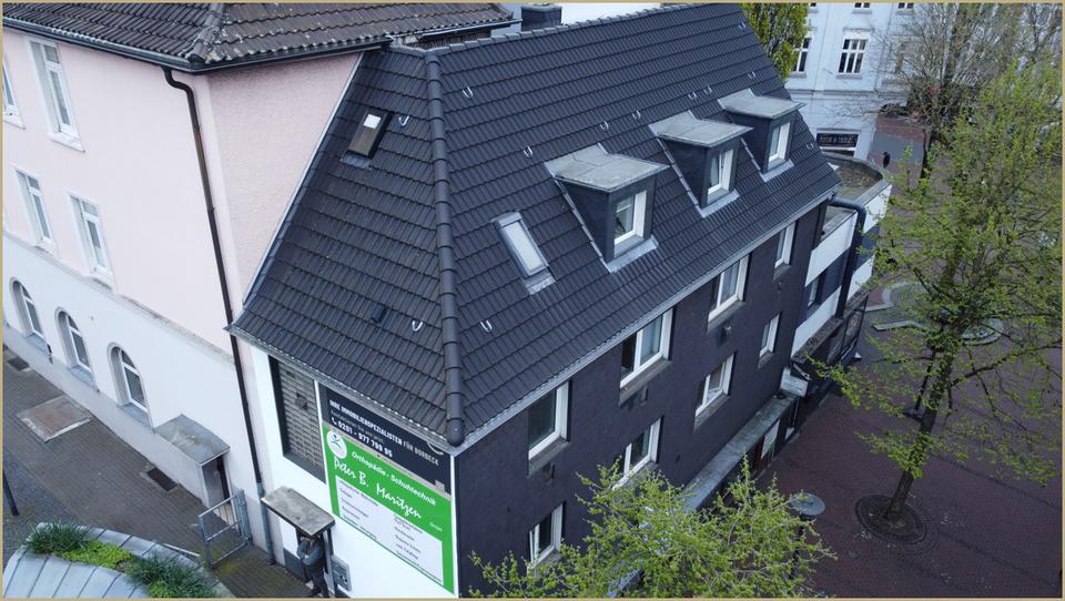 Mehrfamilienhaus mit Gewerbeeinheit – attraktive Kapitalanlage in zentraler Lage zimmer